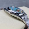 Rolex replica oyster perpetual 124300 celebration dial 41mm5.jpg