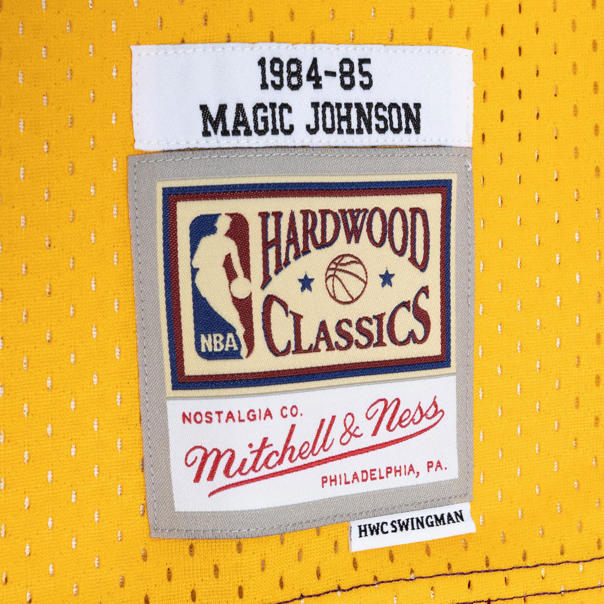 magic johnson los angeles lakers mitchell 26amp ness hardwood classics 198485 split swingman jersey purplegold 8822 sws8l.jpg