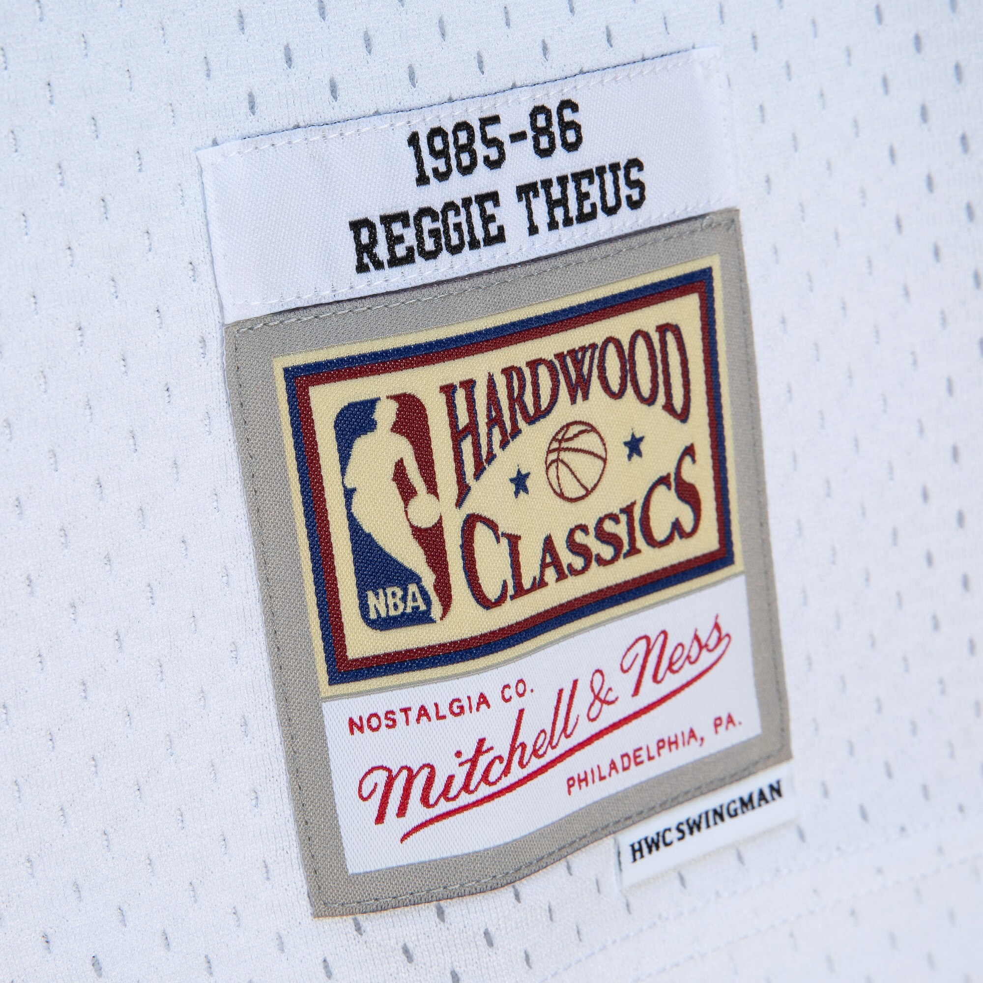 reggie theus sacramento kings mitchell 26amp ness 198586 hardwood classics fadeaway swingman player jersey whitelight blue 6498 bpldt.jpg